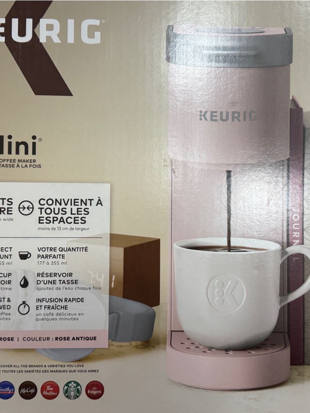 Brand new Keurig K-Mini single serve coffee maker in a dusty rose/pink color.